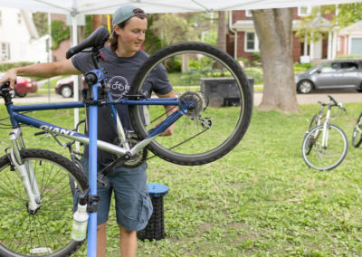 bike mechanic repairing bicycle